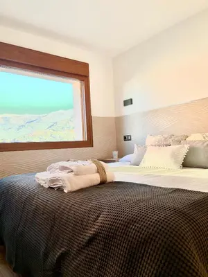 Cama o camas de una habitación en El Balcón De Gredos