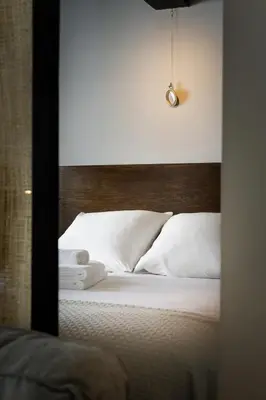 Cama o camas de una habitación en La Antigua Fonda Relator