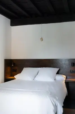 Cama o camas de una habitación en La Antigua Fonda Relator
