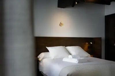 Cama o camas de una habitación en La Antigua Fonda Relator