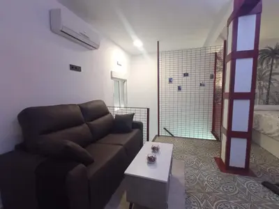 Zona de estar de Estudio The Room Tres Ocho