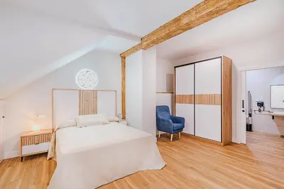 Cama o camas de una habitación en Encantos del Jerte Apartamentos