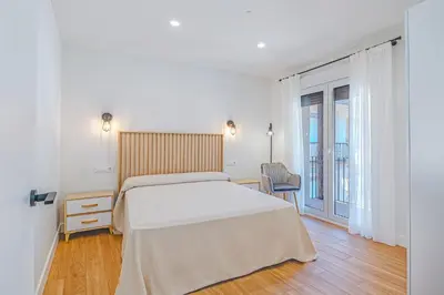Cama o camas de una habitación en Encantos del Jerte Apartamentos