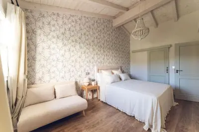 Cama o camas de una habitación en La Casa del Jardín