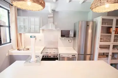 Una cocina o zona de cocina en La Casa del Jardín
