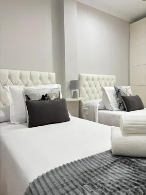 Cama o camas de una habitación en Apartamento Boutique Plaza Mayor