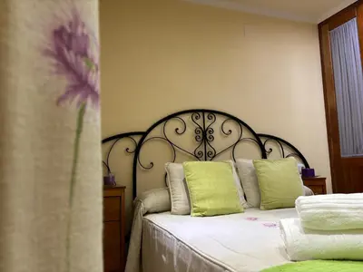 Cama o camas de una habitación en Apartamento Boutique Plaza Mayor