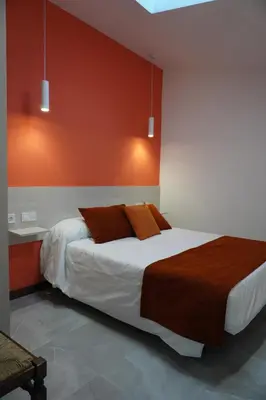 Cama o camas de una habitación en Duplex Llume - Grupo Apartamentos Sanin