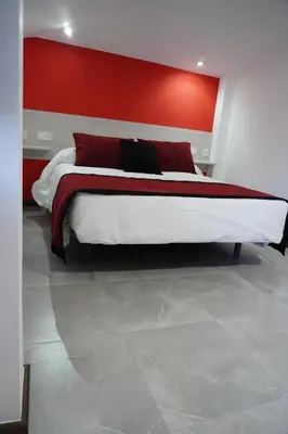 Cama o camas de una habitación en Duplex Llume - Grupo Apartamentos Sanin