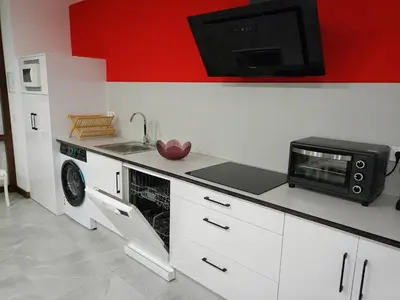 Una cocina o zona de cocina en Duplex Llume - Grupo Apartamentos Sanin
