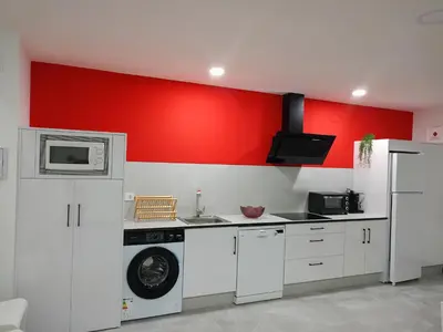 Una cocina o zona de cocina en Duplex Llume - Grupo Apartamentos Sanin
