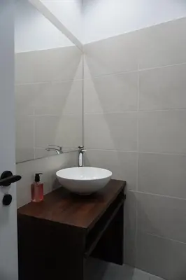 Un baño de Duplex Llume - Grupo Apartamentos Sanin