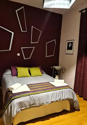 Cama o camas de una habitación en Las Cuatro Esquinas de Cáceres