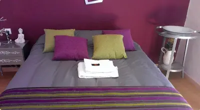 Cama o camas de una habitación en Las Cuatro Esquinas de Cáceres