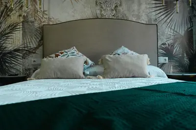 Cama o camas de una habitación en Apartamentos La Posada