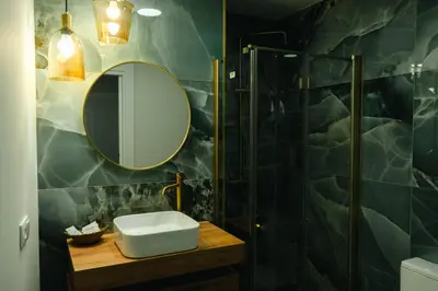 Un baño de Apartamentos La Posada