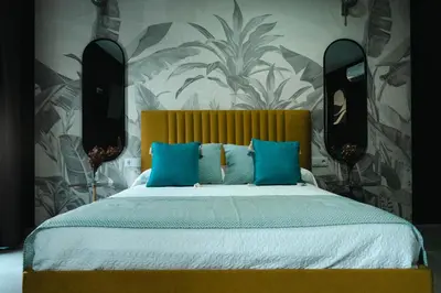 Cama o camas de una habitación en Apartamentos La Posada