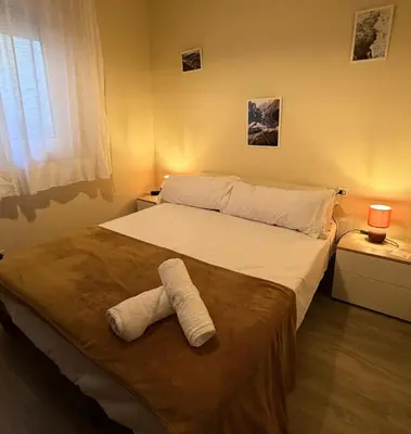 Cama o camas de una habitación en Apartamento VUT La Escuela El Barco de Ávila