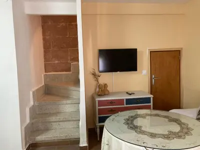 Una televisión o centro de entretenimiento en Ca Meme Valle del Jerte