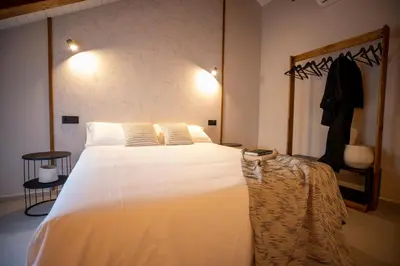 Cama o camas de una habitación en Doce Slow Home