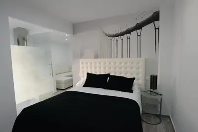 Cama o camas de una habitación en Apartamentos Torrecilla