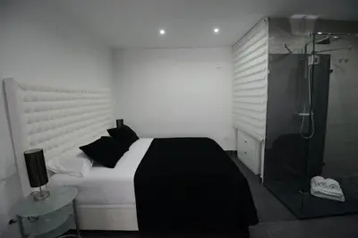 Cama o camas de una habitación en Apartamentos Torrecilla