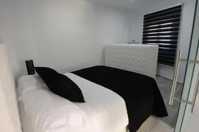 Cama o camas de una habitación en Apartamentos Torrecilla