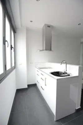 Una cocina o zona de cocina en Apartamentos Torrecilla