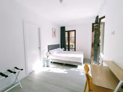 Cama o camas de una habitación en Hotel Gran Vía by gaiarooms