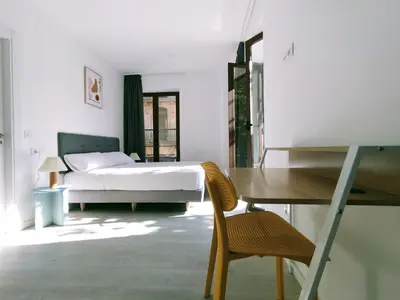 Cama o camas de una habitación en Hotel Gran Vía by gaiarooms