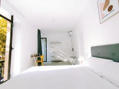 Cama o camas de una habitación en Hotel Gran Vía by gaiarooms