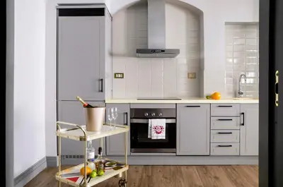 Una cocina o zona de cocina en Blue Windows House Apartamentos & Suites