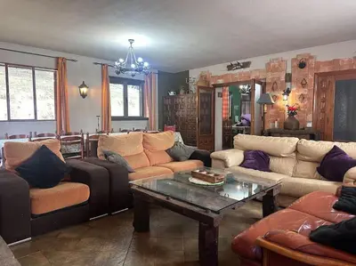 Zona de estar de Casa para fiestas 16 personas, barbacoa y terraza