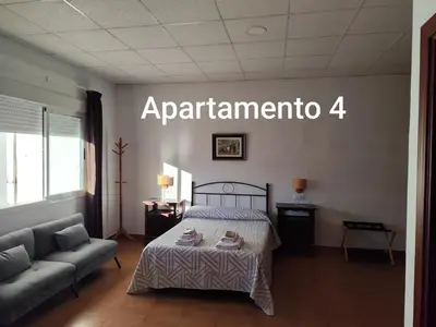 Cama o camas de una habitación en Apartamentos Rurales Las Grullas