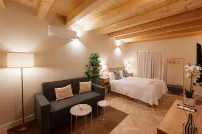 Cama o camas de una habitación en Casa Cancho 2 - La Guarnicionería