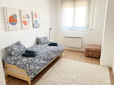 Cama o camas de una habitación en Apartamento de cuatro habitaciones en Talavera
