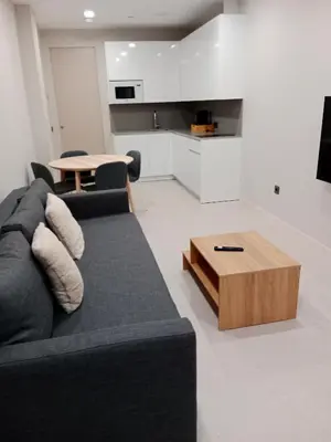Una cocina o zona de cocina en Apartamentos Living Libreros