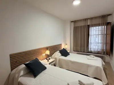 Cama o camas de una habitación en Tentenecio Catedral Casco Histórico