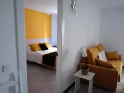Cama o camas de una habitación en APARTAMENTO Sanin 2