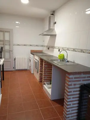 Una cocina o zona de cocina en La Muralla de Gredos