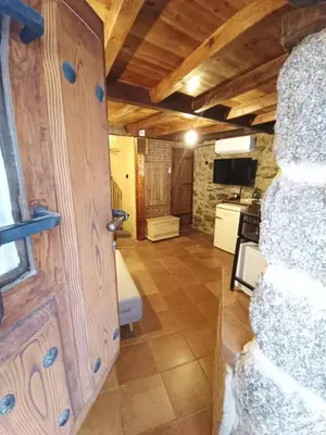 Una cocina o zona de cocina en La Casita de Piedra
