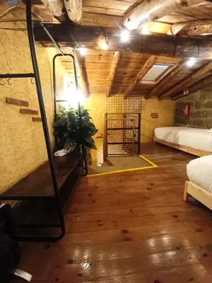 Cama o camas de una habitación en La Casita de Piedra