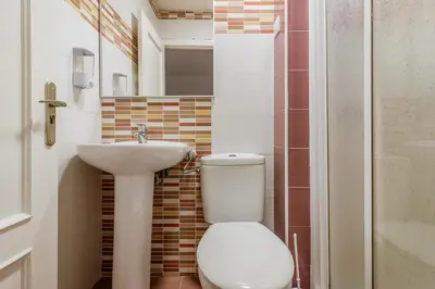 Un baño de Doña Norma
