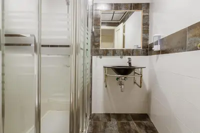 Un baño de Doña Norma