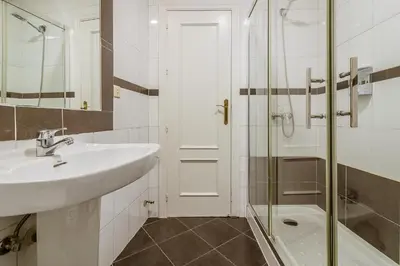 Un baño de Doña Norma