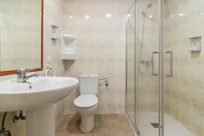 Un baño de Doña Norma