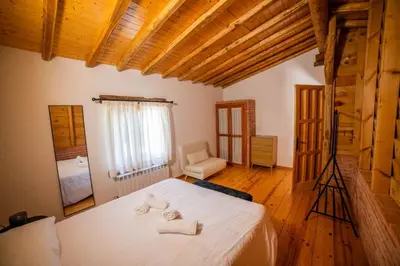 Cama o camas de una habitación en Alojamientos El Picoto Navasfrías