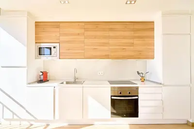 Una cocina o zona de cocina en El mirador de Plasencia by keyhom
