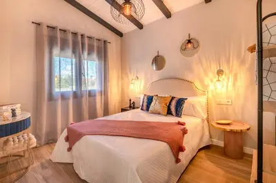 Cama o camas de una habitación en Alojamientos Singulares Maestro24