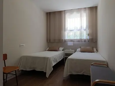 Cama o camas de una habitación en Amplio y tranquilo apartamento casa